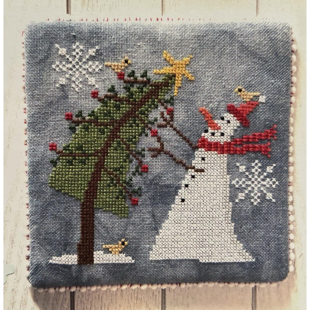 Trimming the Tree counted cross stitch pattern by Bendy Stitchy Designs